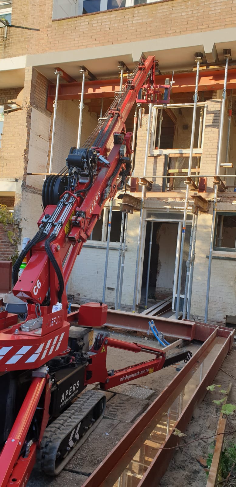 Minihijskraan met balkendrukker